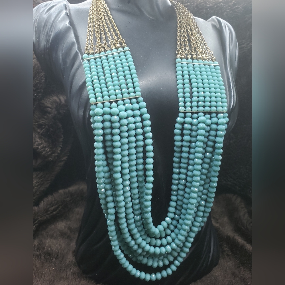 Beautiful necklace with 8 strands of glass beads, faceted and fire polished